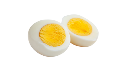 two hard boiled eggs cut in half on a white surface