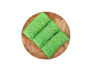 Dadar gulung cake, Indonesian food shaped long round filled with grated coconut and liquid palm sugar