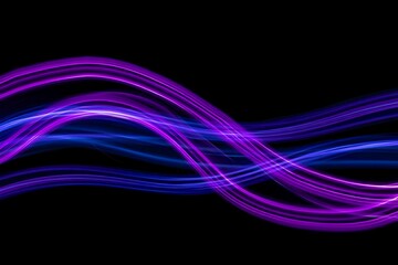 Abstract Wavy Light Streaks of Purple and Blue on a Black Background