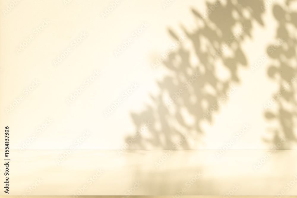 Poster Wall interior background, studio and backdrops show products. with leaf shadow from window color beige and white. background for text insertion and presentation of product	