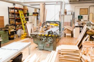 Obraz premium Flat design is showing green table saw and wood boards in workshop, with dust pipes