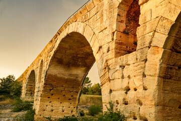 View from below of part of the famous Roman bridge Pont Julien in Bonnieux, Luberon, France....