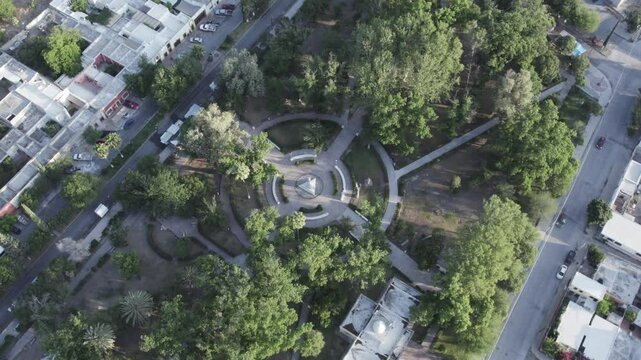 Drone footage at sunrise over Parras de la Fuente, showing urban layout and surrounding terrain under clear sky conditions, captured in stable 4K resolution with smooth tracking and overhead shots.