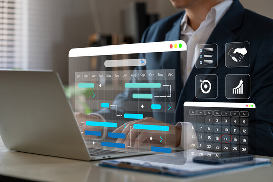 Management diagram with planning software on laptop screen.