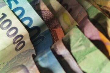 Indonesian Rupiah Stack CloseUp of Colorful Banknotes Texture