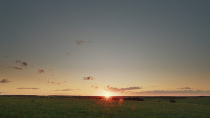 Experience the Stunning Sunrise Over a Serene and Beautiful Landscape this morning