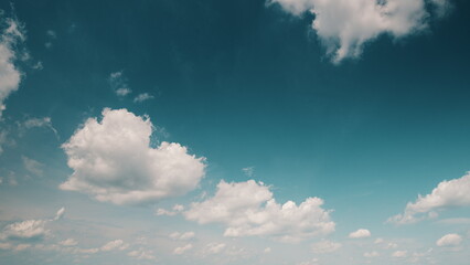 Time lapse. The Beautiful Blue Sky adorned with Fluffy and Soft White Clouds completely captivates the heart
