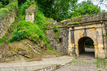 Defensive constructions on top of Mount Urgull next to the tourist city of San Sebastian.
