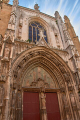 The imposing entrance of Saint Sauveur Cathedral, Aix-en-Provence, with its sculpted portal and...