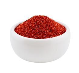Korean red chili pepper flake, ground powder coarse paprika or Gochugaru in white bowl cutout