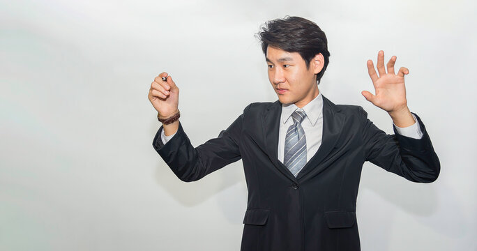 Handsome confident businessman wearing suit standing isolated over white background - Powered by Adobe