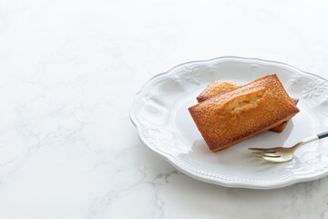 フィナンシェ　焼き菓子　スイーツ　コピースペース　背景