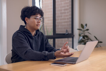 Social media and digital online concept, man using smart phone. The concept of living on vacation and playing social media. Social Distancing ,Working From Home