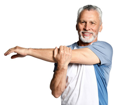 Smiling mature man with gray beard stretching arm across chest in athletic wear on white background - Powered by Adobe