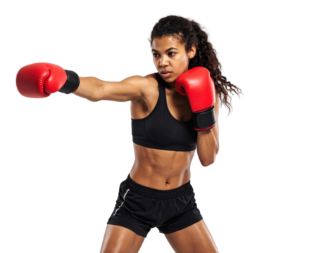 Athletic woman in boxing stance with red gloves throwing punch on transparent background showcasing fitness and martial arts training.