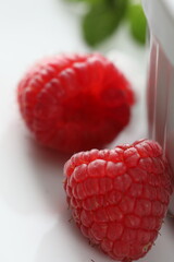 fresh raspberries on background, close up