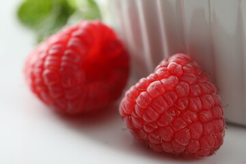 fresh raspberries on background, close up