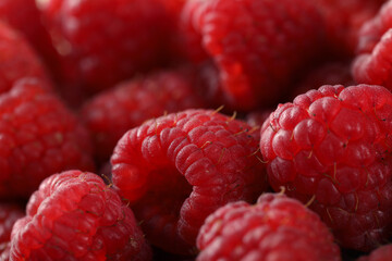 fresh raspberries on background, close up