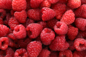 fresh raspberries on background, close up