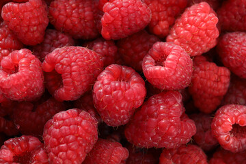 fresh raspberries on background, close up