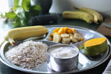 Yogurt and Rice Flakes with Mango, Banana  Dahi Chiura, National Paddy Day Special Dish in Nepal