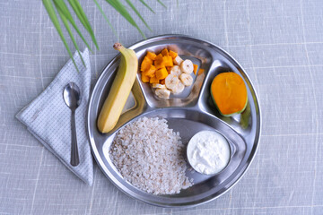 Yogurt and Rice Flakes with Mango, Banana  Dahi Chiura, National Paddy Day Special Dish in Nepal