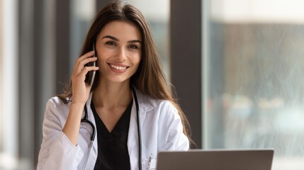 Woman Doctor on Phone with Laptop

