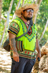 
Portrait of a Costa Rican Latino man in colorful Caribbean shirt visiting Cahuita National Park, Costa Rica