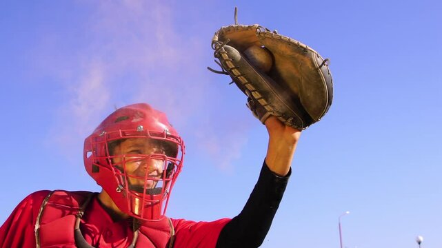 A Dynamic and Energetic Baseball Catcher in Action, Surrounded by Dust Clouds and Excitement