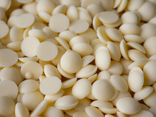 White chocolate chips Pistols buttons. Confection and pastry concept.