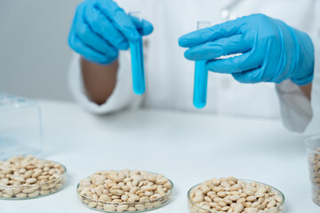 Scientist analyze biochemical sample in advanced scientific laboratory. Medical professional check...