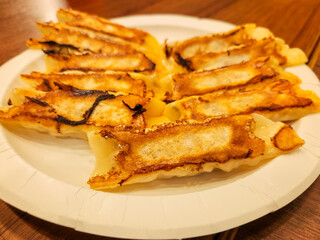 A photo of a plate of Taiwanese dumplings.