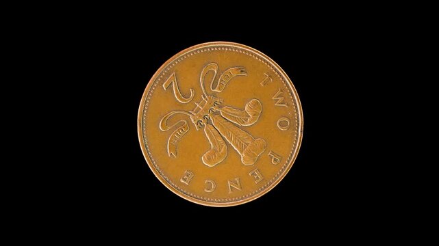 United Kingdom 2004 two pence coin reverse with Prince of Wales badge rotating on black background