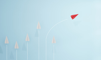 Red paper plane flying away from a group of white planes on blue background. Concept of leadership, innovation, individuality, thinking different, and unique direction.