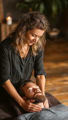 Reiki Session in Minimalist Zen Spa – Female Therapist Practicing Reiki Over Male Client Lying Face-Up on Massage Table, Slight Uncertainty in Client's Expression