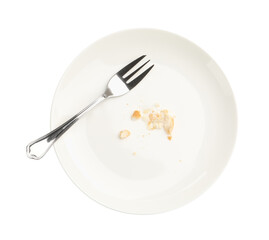 Dirty plate with bread crumbs and fork isolated on white, top view