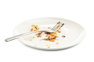 Dirty plate with crumbs, sauce and fork isolated on white