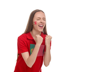 Excited fan with flags of Portugal on her cheek and t-shirt against white background. Space for text