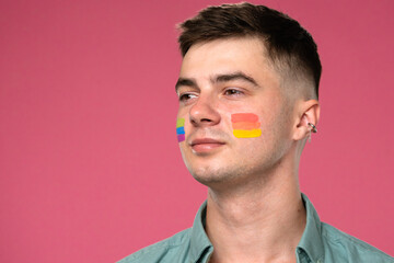 Colorful Pride Face Paint Design with Pink Background