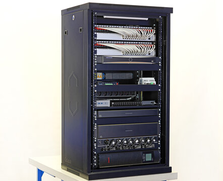 Cabeus low-current equipment rack in the apartment. Ubiquiti Ethernet switches, VSSL amplifiers, Hikvision DVR. Uninterruptible DKC power supply. 