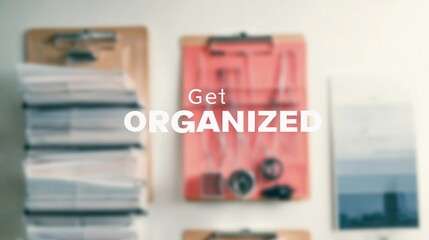 Encouraging text "Get Organized" overlaying a soft-focus office space, used for promoting time management and workflow tips.
