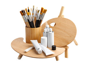 artist palette with paintbrushes and paint tubes  on white background
