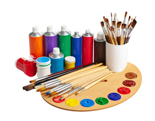 artist palette with paintbrushes and paint tubes  on white background