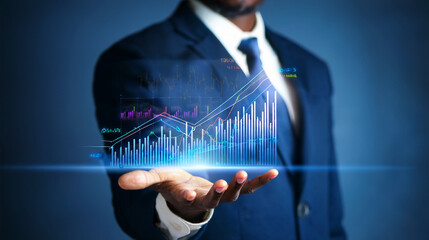 African American professional displays a holographic financial growth chart projecting success in a modern corporate environment.