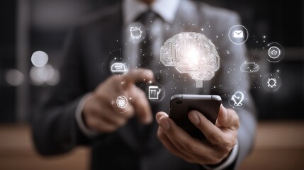A man is holding a cell phone and pointing at a brain on the screen