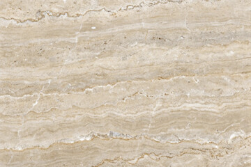 Old brown stone wall with a rough, grunge texture perfect for vintage backgrounds and antique designs