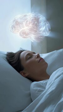 Closeup of young Caucasian woman sleeping peacefully in bed with white sheets and with glowing brain animation hologram above, concept for dreaming and mental activity during sleep
