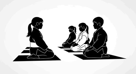  Children in kimono sitting on tatami on martial arts seminar