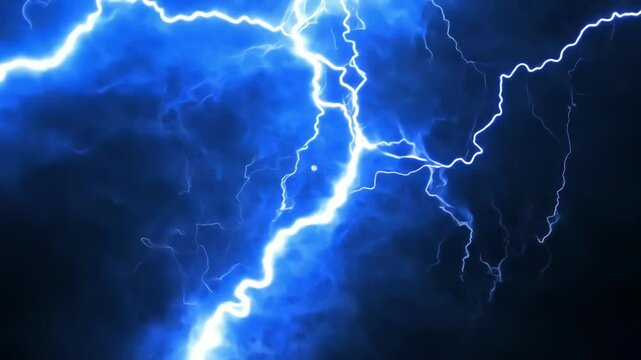 Powerful electric lightning strikes flash dramatically across dark stormy night sky creating spectacular natural light display with intense blue white energy bolts