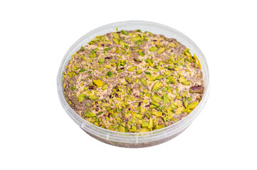 Turkish Halva with tahini and pistachio isolated on a white background. top view